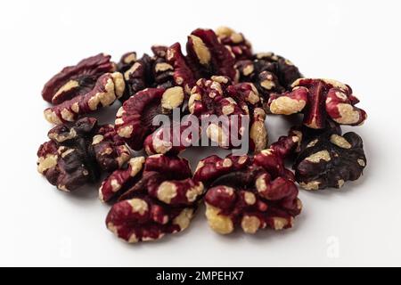 Red walnuts on a white background Stock Photo