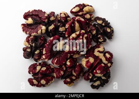 Red walnuts on a white background Stock Photo