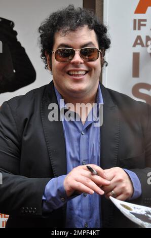 Josh Gad signs autographs for fans after a complimentary fan performance of 'Book of Mormon.' This performance was his last with the show. He is leaving to continue production of a television pilot picked up by NBC for the fall season. New York, NY. 6th June 2012. Stock Photo