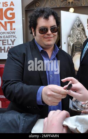 Josh Gad signs autographs for fans after a complimentary fan performance of 'Book of Mormon.' This performance was his last with the show. He is leaving to continue production of a television pilot picked up by NBC for the fall season. New York, NY. 6th June 2012. Stock Photo