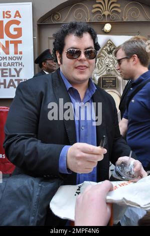 Josh Gad signs autographs for fans after a complimentary fan performance of 'Book of Mormon.' This performance was his last with the show. He is leaving to continue production of a television pilot picked up by NBC for the fall season. New York, NY. 6th June 2012. . Stock Photo