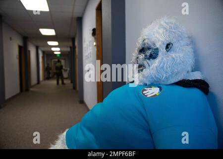 The “Yeti”, 354th Range Squadron (RANS) mascot, sits in a hallway at Eielson Air Force Base, Alaska, Oct. 12, 2022. The 354th RANS has seven sections which include scheduling, maintenance, airspace management, engineering, plans and programs, support, and threat systems. Stock Photo