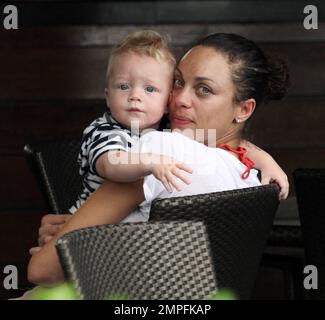 Former number one professional tennis player Boris Becker and his wife  Sharlely 'Lilly' Kerssenberg Becker enjoy a relaxing lunch at their luxury  hotel with friends and their baby son Amadeus Benedict Edley