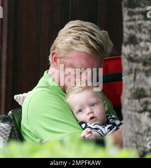 German tennis player Boris Becker and his wife Sharlely 'Lilly' Kerssenberg  Becker have tender moments with their 8-month-old son Amadeus Benedict  Edley Luis Becker during their Labor Day long weekend vacation. The