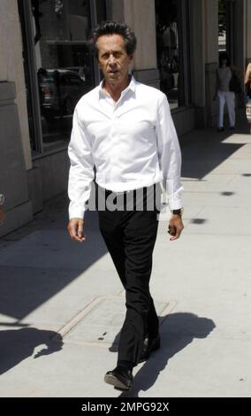 EXCLUSIVE!! '24' producer Brian Grazer strolls in Beverly Hills. Grazer, who also produces the hit series 'Friday Night Lights' has nine projects due for release through 2013, including 'The Dark Tower,' 'Playboy,' and 'Cowboys and Aliens,' which is due out in July. Beverly Hills, CA. 5/6/11. Stock Photo