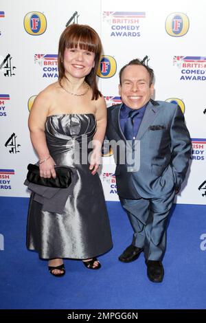 Warwick Davis and wife Samantha arrive at the British Comedy Awards held at the O2 Arena and hosted by Jonathan Ross. London, UK. 01/22/11. Stock Photo