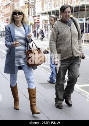 With bandages covering her left hand, actress Britt Eckland leaves the BBC in London, UK. 5/10/10. Stock Photo