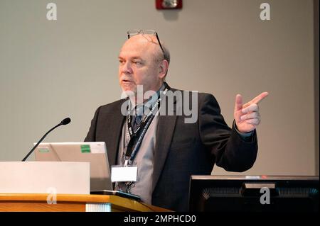 MCLEAN, Va. (Oct. 18, 2022) - Brian Helliwell, Defense Counterintelligence and Security Agency (DCSA) eAPP product owner, briefs cleared industry security professionals on the National Background Investigation Services (NBIS) eApp at the 2022 NBIS Industry Conference. NBIS e-App contains the investigative standard forms that federal applicants and employees use to provide the necessary information to process their personnel background investigations. Helliwell was among the NBIS experts who briefed cleared industry on NBIS - the backbone of the Trusted Workforce 2.0 whole-of-government backgro Stock Photo