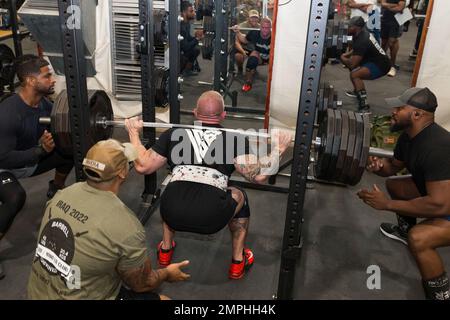 Soldiers in the 801st Field Hospital who are part of Joint Task Force Med 374 competed in the 500lb/1000lb weight lifting competition in Baghdad, Iraq. The rules are, you get three attempts to lift as much weight as you can at three stations; the bench press, deadlift and the squat. Females had to lift a combined weight of over 500lbs, men who weigh less than 165lbs must lift a combined weight of over 750lbs and men who weigh over 165lbs must lift a combined weight of over 1000lbs. Sgt. Justin McCurdy, a 68A Biomedical Equipment Specialist with the 801st Field Hospital, won the competition by Stock Photo