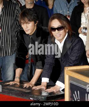 Vocalist Koshi Inaba (L) And Guitarist Tak Matsumoto Of The Japanese ...