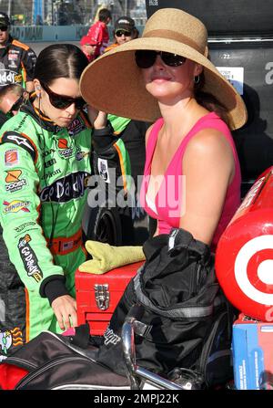 Indy Racing League driver Danica Patrick (L) hangs out with actress Ashley Judd, wife of competing race car driver Dario Franchitti, prior to Danica and Dario's qualifying run during the Cafe do Brasil Indy 300 held at the Homestead-Miami Speedway.  Homestead, FL. 10/01/10. Stock Photo