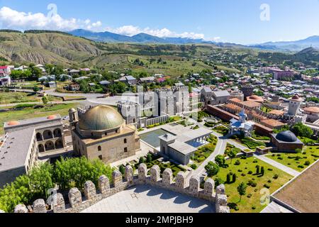 Landscape of Akhaltsikhe (Rabati) Castle courtyard, medieval fortress in Akhaltsikhe, Georgia with Akhaltsikhe village and Lesser Caucasus mountains. Stock Photo