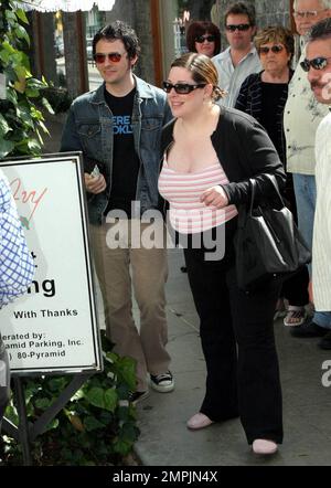 A heavily pregnant Carnie Wilson with hubby Rob Bonfiglio lunches at the Ivy in Los Angeles, Ca. Wilson has only 4 weeks to go until she gives birth to the couple's first child which is expected to be a girl called Lola. 4/14/05 Stock Photo