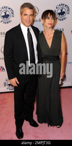 Dermot Mulroney and girlfriend Tharita Catulle attending the 32nd Anniversary Carousel of Hope Ball at the Beverly Hilton Hotel in Beverly Hills, CA. 10/23/10. Stock Photo