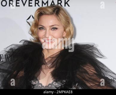 Madonna attends the premiere of The Weinstein Company's 'W.E.' at the Ziegfeld Theater in New York City on January 23, 2012.  Photo Credit: Henry McGee/MediaPunch Stock Photo
