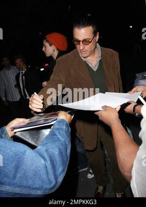 Exclusive!! Actor Andy Garcia arrives at the Staples Center to attend the Lakers Game and stops to sign autographs for fans. Los Angeles, CA. 1/20/09. Stock Photo