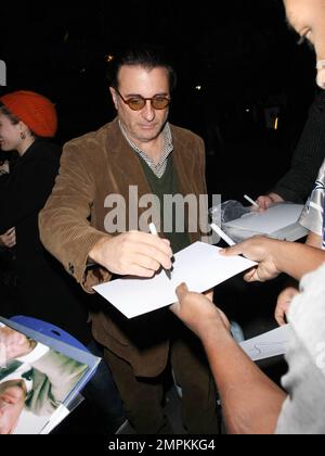 Exclusive!! Actor Andy Garcia arrives at the Staples Center to attend the Lakers Game and stops to sign autographs for fans. Los Angeles, CA. 1/20/09. Stock Photo