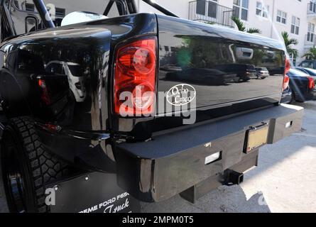 EXCLUSIVE!! Cincinnati Bengals Wide Receiver Chad Ochocinco parallel parks his custom Extreme Ford F650 Super Truck near David's Cafe just off of South Beach's popular Lincoln Road. Ochocinco spent some time shopping and having lunch with fiancŽe Evelyn Lozada. Miami Beach, FL. 2/22/11. Stock Photo