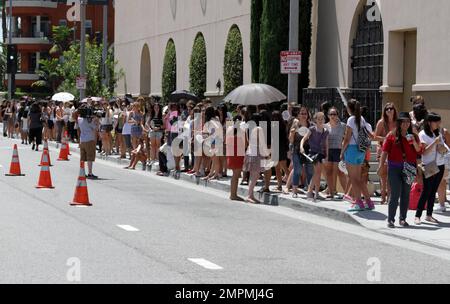 General atmosphere of fans standing in long lines under the hot summer heat in hopes to catch a glimpse of Cher Lloyd's performance at the TEEN VOGUE's Back-to-School Saturday Event held at The Grove in Los Angeles, CA. 11th August 2012. Stock Photo