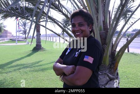 Karen Butler, management and program analyst, Civilian Personnel Officer, Area Support Group – Kuwait, poses in front of ASG-KU headquarters building, Sept. 11, 2022. Stock Photo