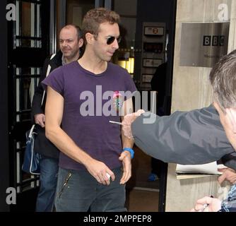 Will Champion of Coldplay arrives at the BBC Radio 1 studios London,  England - 17.12.10 Stock Photo - Alamy