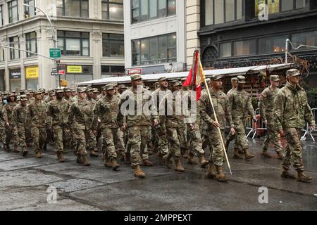 U.S. Army National Guard Soldiers march along 5th Avenue during a Veterans Day parade November 11, 2022. Stock Photo