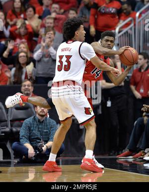 Saint Francis guard Andre Wolford 14 looks for help as