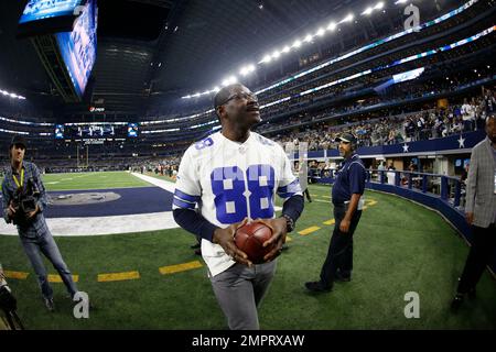 Former Dallas Cowboys player Michael Irwin runs into Texas Stadium during a  post-game ceremony December 20, 2008 commemorating the final NFL regular  season game at the historic venue in Irving, Texas. This