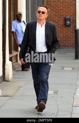 Oscar-winning director Danny Boyle strolls in London's Soho. London, UK. 5/24/10. Stock Photo