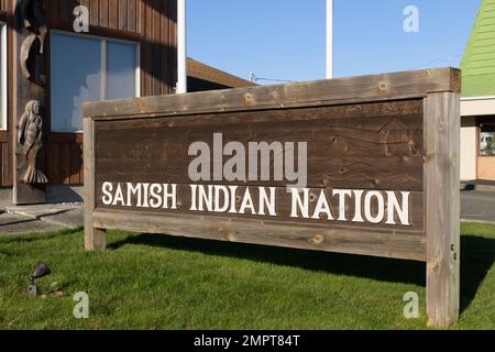 Anacortes, WA, USA - January 29, 2023; Wooden sign outside Samish Indian Nation location in Anacortes WA Stock Photo