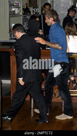 After recovering from an Achilles Tendon injury suffered last March, David Beckham grabs a bite at the restaurant Cleo at The Redbury. David strolled through the restaurant with his hand on a friend's shoulder and semmed very interested in what other diners were having for dinner. Hollywood, CA. 9/14/10. Stock Photo