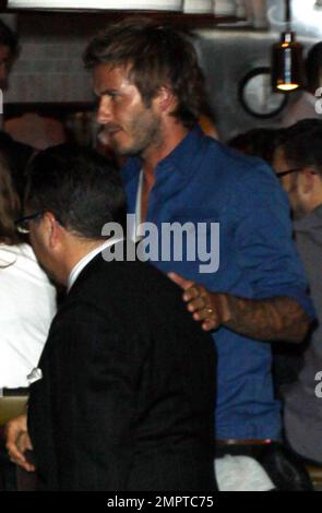 After recovering from an Achilles Tendon injury suffered last March, David Beckham grabs a bite at the restaurant Cleo at The Redbury. David strolled through the restaurant with his hand on a friend's shoulder and semmed very interested in what other diners were having for dinner. Hollywood, CA. 9/14/10. Stock Photo