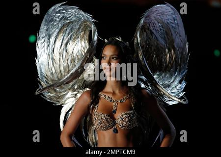 Brazilian model Lais Ribeiro gestures on stage as she presents the $2  million Champagne Nights Fantasy Bra by Mouawad, during the Victoria's  Secret fashion show at the Mercedes-Benz Arena in Shanghai, China