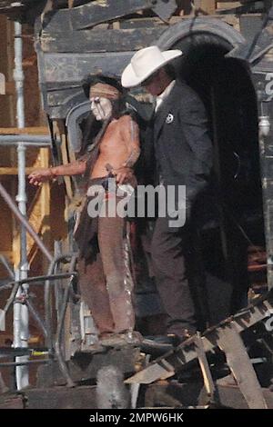 Johnny Depp and Armie Hammer, dressed in their characters Tonto and the