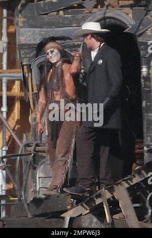 Johnny Depp and Armie Hammer, dressed in their characters Tonto and the