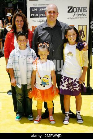 Writer Ken Daurio and family pose on the yellow carpet at the premiere of 'Despicable Me' held at Nokia Theatre L.A. Live.  Universal Pictures' new 3-D CGI film, which features the voices of Russell Brand, Steve Carell and Julie Andrews, took place during the 2010 Los Angeles Film Festival. Los Angeles, CA. 06/27/10. Stock Photo