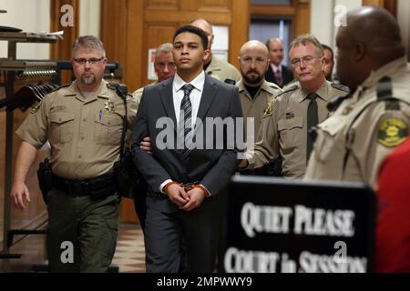 Jorge Sanders-Galvez, Left, Is Escorted From An Elevator To The South ...