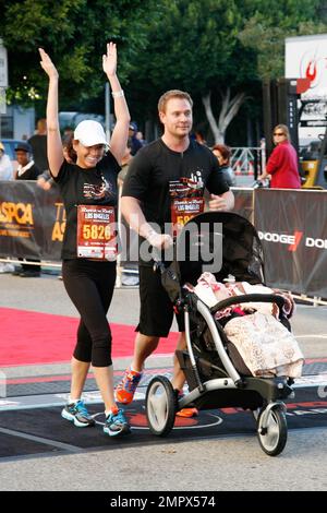 Melissa Rycroft, husband Tye Strickland, and daughter Ava Grace attend the Dodge Rock 'N' Roll Los Angeles 1/2 marathon and mini marathon benefiting ASPCA at L.A. LIVE. Los Angeles, CA. 30th October 2011.   . Stock Photo