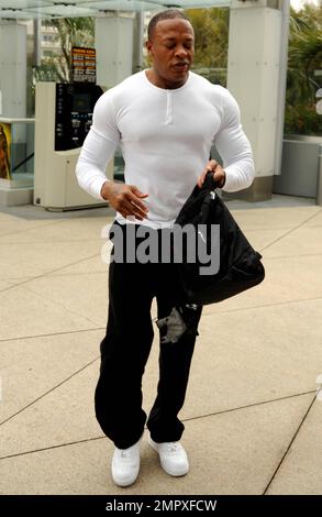 EXCLUSIVE!! Rapper, entrepreneur and music mogul Dr Dre shows off his muscular physique in a tight fitting white shirt as he leaves the gym in West Hollywood, CA. 16th September 2011. Stock Photo