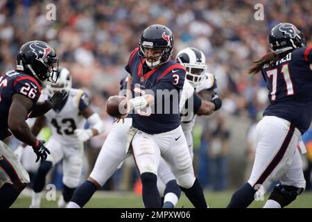 FILE - In this Nov. 11, 2018, file photo, Seattle Seahawks quarterback  Russell Wilson (3) battles Los Angeles Rams defensive end Aaron Donald (93)  for a ball Wilson lost on a fumble