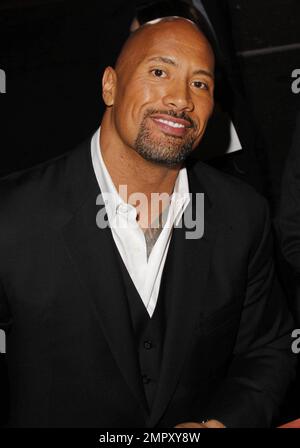 Actor Dwayne Johnson aka 'The Rock' arrives at the Los Angeles Premiere of 'Journey 2: The Mysterious Island' held at the Grauman's Chinese Theatre. Los Angeles, CA. 2nd February 2012. Stock Photo