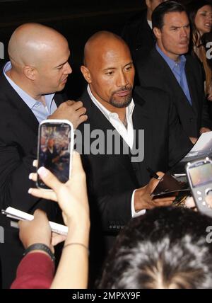 Actor Dwayne Johnson aka 'The Rock' arrives at the Los Angeles Premiere of 'Journey 2: The Mysterious Island' held at the Grauman's Chinese Theatre. Los Angeles, CA. 2nd February 2012. Stock Photo