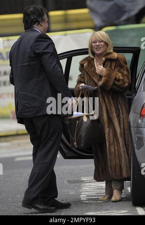 Singer and DJ Elaine Page looks striking in a full-length fur coat
