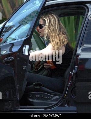 Actress Elizabeth Berkley was spotted leaving her yoga class. She then spent a while sitting in the car talking on her cell phone before heading off to Toys R Us. Los Angeles, CA. 6/30/09. Stock Photo