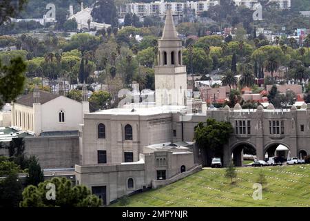 Mourners leave Forest Lawn Memorial Cemetery in limousines after funeral services were held for legendary actress Elizabeth Taylor. Taylor was buried in the cemetary next to hear parents and near friend Michael Jackson and other celebrities. The actress died yesterday of Congestive Heart Failure after being hospitalized for weeks. Los Angeles, CA. 3/24/11. Stock Photo