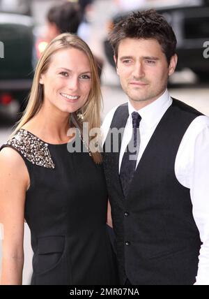 Tom Chambers and wife Clare Harding pose for the camera at the English ...