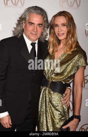 LOS ANGELES, CA - JANUARY 23: Producer Mitch Glazer (L) and actress Kelly Lynch arrive at the 27th Annual Producers Guild Awards at the Hyatt Regency Century Plaza on January 23, 2016 in Century City, California.   Photo Ents Images/OIC  0203 174 1069 Stock Photo