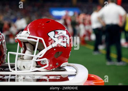 Kansas City Chiefs helmets sit on a cooler during the first half