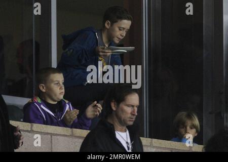 Actress Eva Longoria joins Victoria Beckham and family to watch David Beckham and the LA Galaxy in the first round of the playoffs. Eva seems to enjoy her time with the Beckham clan as she sips wine and at some point even holds and plays with baby Harper Seven, who is almost 3-months old. Los Angeles, CA. 3rd November 2011.   . Stock Photo