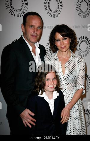 Jennifer Grey, husband Clark Gregg and daughter Stella at An Evening with Joel Grey. The event, held at The Paley Center, celebrated the career of Oscar, Tony, Golden Globe and BAFTA award-winning actor Joel Grey. Los Angeles, CA. 1/18/11. Stock Photo
